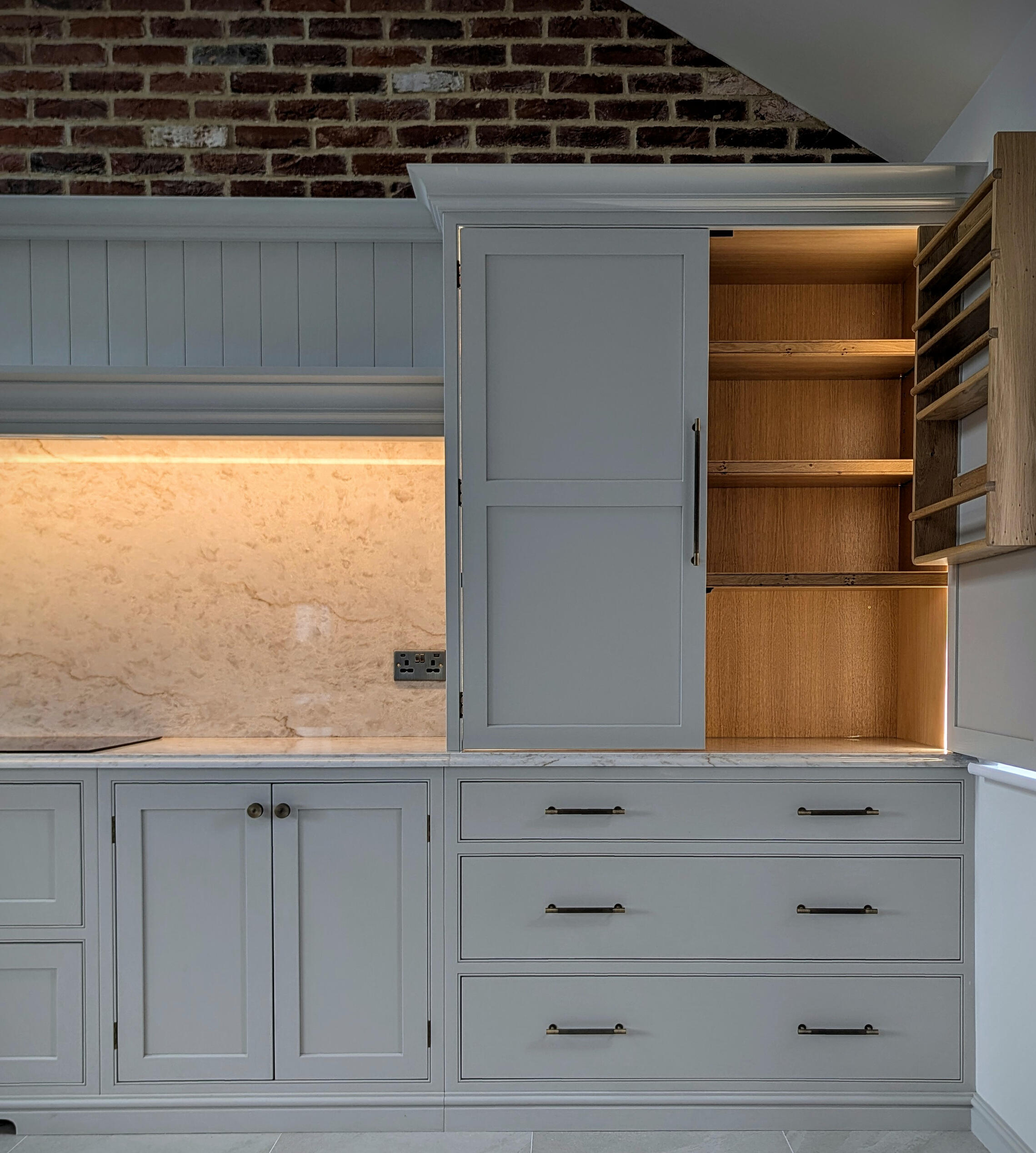 Shaker kitchen In frame beaded shaker cabinets with Belfast sink. Solid ash kitchen handmade by Joshua howard joinery in Leeds.